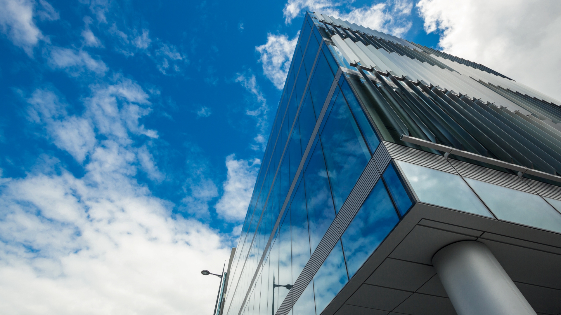 Low angle view of office building on a sunny day